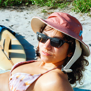 red and sand color surf hat