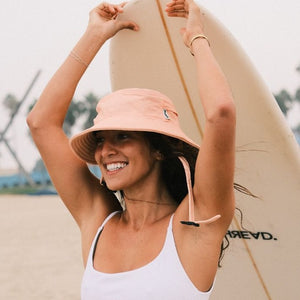 peach color surf hat for sun protection. boonie hat for water sports