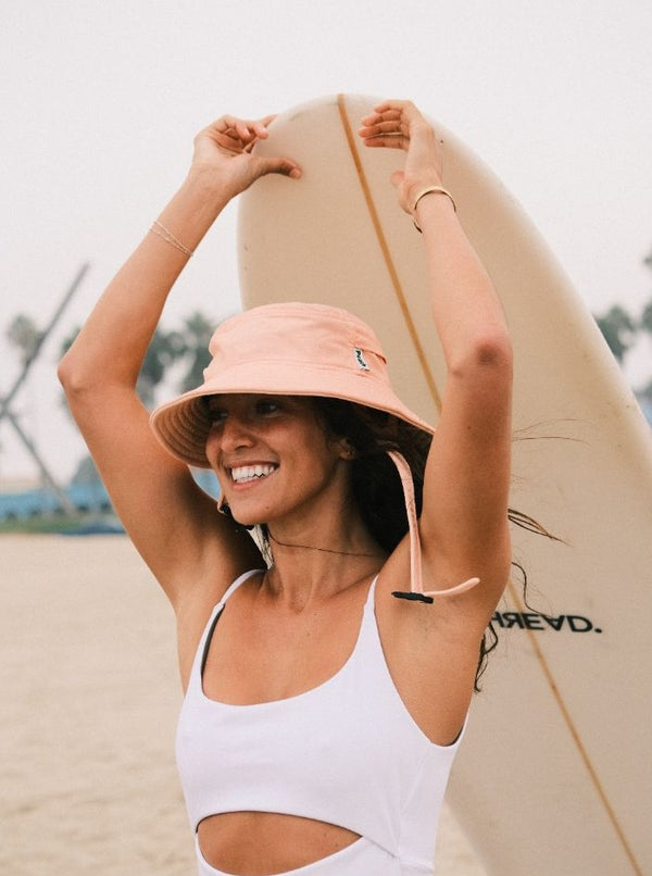 peach color surf hat for sun protection. boonie hat for water sports
