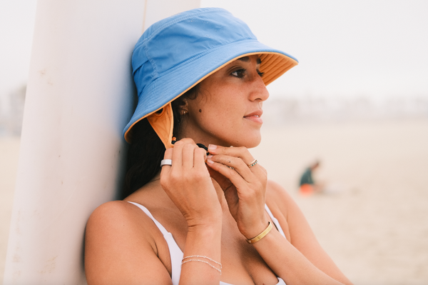 blue and tangerine surf hat