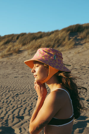 yellow and pink floral surf hat