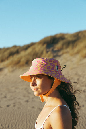 yellow and pink floral surf hat