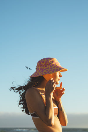 yellow and pink floral surf hat